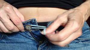 How to make jeans bigger at waist using ordinary hair band.